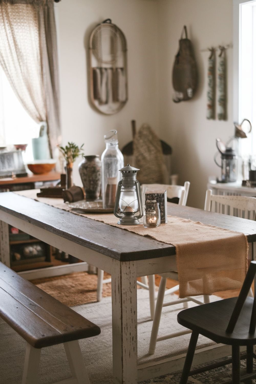 Farmhouse coffee table with a rustic burlap table runner, candles, and decorative accents.