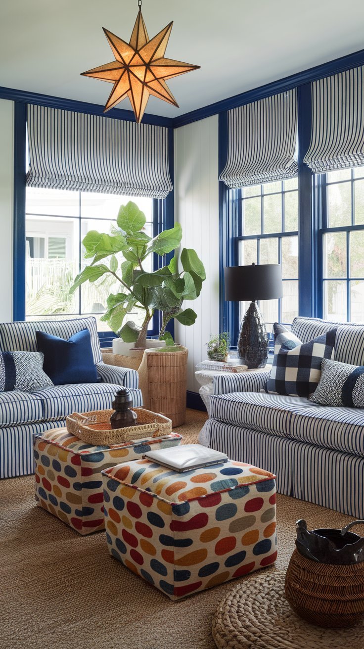 Bright and stylish small living room with blue and white striped sofas, bold patterned ottomans, and a statement star-shaped pendant light, accented with greenery and woven textures.







